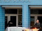 A medical examiner enters the school as police respond to a school shooting at the Perry Middle School and High School complex in Perry, Iowa, U.S., January 4, 2024 (REUTERS/Cheney Orr) 