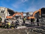 Emergency services clear the rubble of the house of Peshraw Dizayi that was hit in Iranian missile strikes in Irbil, Iraq. (AP) Emergency services clear the rubble of the house of Peshraw Dizayi that was hit in Iranian missile strikes in Irbil, Iraq. (AP)