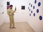 A visitor takes snapshots at the Quimera Gallery of Argentina, during the inauguration of the 'Este arte' exhibition at Vik Pavilion in Jos Ignacio, Maldonado, Uruguay, on January 6, 2024. The bucolic countryside in eastern Uruguay, between seemingly endless golden beaches and undulating grasslands where cows outnumber residents, has become an unlikely hub for art, culture, and gastronomy, being home to Uruguay's only contemporary art museum. A visitor takes snapshots at the Quimera Gallery of Argentina, during the inauguration of the 'Este arte' exhibition at Vik Pavilion in Jos Ignacio, Maldonado, Uruguay, on January 6, 2024. The bucolic countryside in eastern Uruguay, between seemingly endless golden beaches and undulating grasslands where cows outnumber residents, has become an unlikely hub for art, culture, and gastronomy, being home to Uruguay's only contemporary art museum.