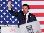 Florida Governor and Republican presidential candidate Ron DeSantis gestures on stage at his Iowa caucus watch party in West Des Moines, Iowa, U.S., January 15, 2024. REUTERS/Brendan McDermid