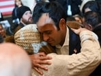 Republican presidential candidate and businessman Vivek Ramaswamy embraces a supporter at his Iowa caucus night watch party after suspending his campaign and endorsing former U.S. President Donald Trump in Des Moines, Iowa, U.S. January 15, 2024. REUTERS/Sergio Flores