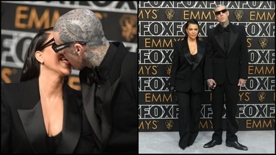 Kourtney Kardashian and Travis Barker share a kiss in black outfits at Emmy (File photo) Kourtney Kardashian and Travis Barker share a kiss in black outfits at Emmy (File photo)
