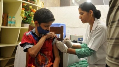 A health worker administering anti-Covid vaccine to a boy during a special vaccination camp for children at the Chandigarh Press Club. (HT Photo/Ravi Kumar) A health worker administering anti-Covid vaccine to a boy during a special vaccination camp for children at the Chandigarh Press Club. (HT Photo/Ravi Kumar)