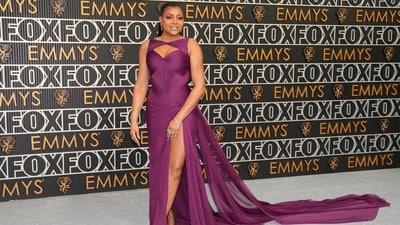Taraji P. Henson donned a sultry sleeveless purple gown featuring a bodice cutout that showcased a fair bit of leg. The gown also boasted a train, aligning with another major trend seen on the red carpet this season.&nbsp; (AP)