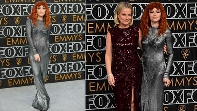 Natasha Lyonne transformed into a futuristic Joan de Arc in a striking metallic Schiaparelli mermaid gown as she walked down the silver carpet at the Emmy Awards. She styled the statement-making ensemble with fiery copper curls, heavy lashes, silver eye shadow, rings, black nail paint, and a nude lip shade. (AFP) Natasha Lyonne transformed into a futuristic Joan de Arc in a striking metallic Schiaparelli mermaid gown as she walked down the silver carpet at the Emmy Awards. She styled the statement-making ensemble with fiery copper curls, heavy lashes, silver eye shadow, rings, black nail paint, and a nude lip shade. (AFP)
