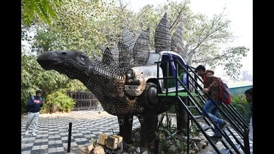 A dinosaur installation that serves as a slide. (Hindustan Times)