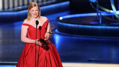 Succession star Sarah Snook looked stunning in a red draped Vivienne Westwood ball gown featuring a plunging neckline. Her ensemble was complemented by a sparkling choker, adding to her elegant appearance.&nbsp; (REUTERS)