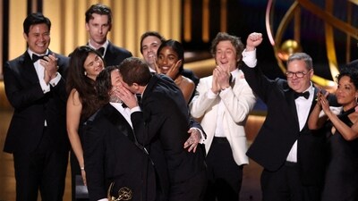 Matty Matheson and Ebon Moss-Bachrach kiss as they accept the award for Outstanding Comedy Series at the 75th Primetime Emmy Awards in Los Angeles. After the ceremony, while talking to the press, Matty Matheson addressed the passionate moment. “It was nice,” he said. In total, The Bear won six Emmys. (REUTERS)