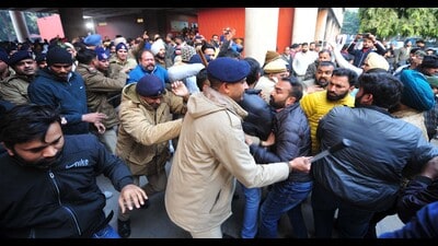 BJP, Congress and AAP workers clashing at the MC office in Sector 17, Chandigarh, on Tuesday. (Keshav Singh/HT) BJP, Congress and AAP workers clashing at the MC office in Sector 17, Chandigarh, on Tuesday. (Keshav Singh/HT)