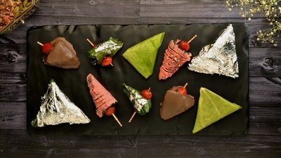 In India, paan is traditionally made by wrapping a betel leaf around areca nut and slaked lime paste. Other ingredients such as tobacco, spices, and sweeteners may be added as per taste. In India, paan is traditionally made by wrapping a betel leaf around areca nut and slaked lime paste. Other ingredients such as tobacco, spices, and sweeteners may be added as per taste.