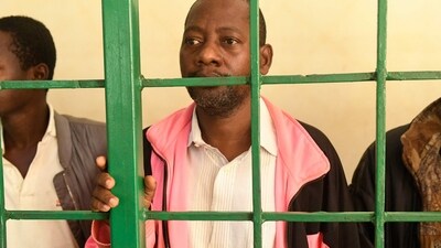 Self-proclaimed pastor Paul Nthenge Mackenzie, (C) who set up the Good News International Church in 2003 is accused of inciting cult followers to starve to death "to meet Jesus". (AFP) Self-proclaimed pastor Paul Nthenge Mackenzie, (C) who set up the Good News International Church in 2003 is accused of inciting cult followers to starve to death "to meet Jesus". (AFP)