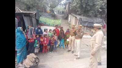 Fire department officials spreading awareness to prevent fire outbreaks in Magh Mela tent city. (HT) Fire department officials spreading awareness to prevent fire outbreaks in Magh Mela tent city. (HT)