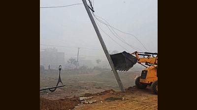 GLADA team conducting demolishing drive in unauthorised colonies situated in Bhamian Kalan and Bhamian Khurd villages in Ludhiana on Tuesday. (HT Photo) GLADA team conducting demolishing drive in unauthorised colonies situated in Bhamian Kalan and Bhamian Khurd villages in Ludhiana on Tuesday. (HT Photo)