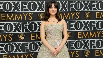 Jenna Ortega stunned in a strapless Dior with a molded skirt in an elegant pastel pattern of blossom applique at the 75th Primetime Emmy Awards. (Getty Images via AFP) Jenna Ortega stunned in a strapless Dior with a molded skirt in an elegant pastel pattern of blossom applique at the 75th Primetime Emmy Awards. (Getty Images via AFP)