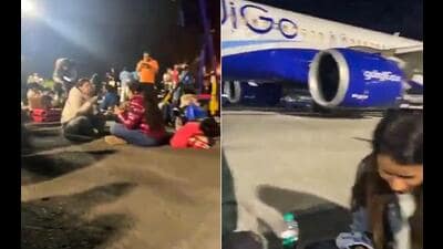 Passengers of a Delhi-bound IndiGo flight, diverted to Mumbai due to operational issues, sat and dined on the airport tarmac on Sunday night. (ANI Photo)