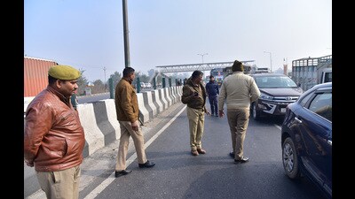 Police at the scene of the accident on NH-9 on Tuesday. The victim is yet to be identified, said police. (Sakib Ali/HT Photo) Police at the scene of the accident on NH-9 on Tuesday. The victim is yet to be identified, said police. (Sakib Ali/HT Photo)
