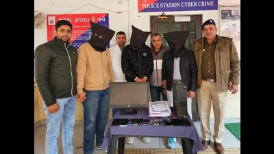 The accused in the custody of Chandigarh Police. The trio was running a fake call centre in Dwarka, Delhi. (Getty image)