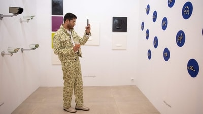 A visitor takes snapshots at the Quimera Gallery of Argentina, during the inauguration of the 'Este arte' exhibition at Vik Pavilion in Jos Ignacio, Maldonado, Uruguay, on January 6, 2024. The bucolic countryside in eastern Uruguay, between seemingly endless golden beaches and undulating grasslands where cows outnumber residents, has become an unlikely hub for art, culture, and gastronomy, being home to Uruguay's only contemporary art museum. (Photo by Santiago MAZZAROVICH / AFP) A visitor takes snapshots at the Quimera Gallery of Argentina, during the inauguration of the 'Este arte' exhibition at Vik Pavilion in Jos Ignacio, Maldonado, Uruguay, on January 6, 2024. The bucolic countryside in eastern Uruguay, between seemingly endless golden beaches and undulating grasslands where cows outnumber residents, has become an unlikely hub for art, culture, and gastronomy, being home to Uruguay's only contemporary art museum. (Photo by Santiago MAZZAROVICH / AFP)
