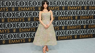 Jenna Ortega stunned in a strapless Dior with a molded skirt in an elegant pastel pattern of blossom applique at the 75th Primetime Emmy Awards. “This was the last dress I tried on. It's such an art piece. it literally stands on its own,” she said in an interview. (Getty Images via AFP) Jenna Ortega stunned in a strapless Dior with a molded skirt in an elegant pastel pattern of blossom applique at the 75th Primetime Emmy Awards. “This was the last dress I tried on. It's such an art piece. it literally stands on its own,” she said in an interview. (Getty Images via AFP)