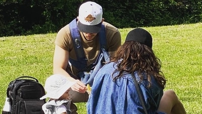 Priyanka Chopra with Nick Jonas and Malti. Priyanka Chopra with Nick Jonas and Malti.
