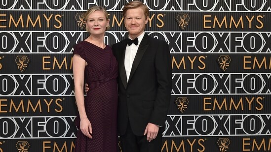 Kristen Dunst, left, and Jesse Plemons arrive at the 75th Primetime Emmy Awards on Monday, Jan. 15, 2024, at the Peacock Theatre in Los Angeles. (Richard Shotwell/Invision/AP)