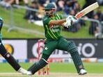 Pakistan's Babar Azam (R) bats while being watched by New Zealand's wicketkeeper Tim Seifert during the third Twenty20 international cricket match between New Zealand and Pakistan Pakistan's Babar Azam (R) bats while being watched by New Zealand's wicketkeeper Tim Seifert during the third Twenty20 international cricket match between New Zealand and Pakistan