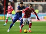 West Ham United's Greek defender Konstantinos Mavropanos (L) fights for the ball with Bristol City's Albanian midfielder Anis Mehmeti West Ham United's Greek defender Konstantinos Mavropanos (L) fights for the ball with Bristol City's Albanian midfielder Anis Mehmeti