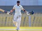 Riyan Parag of Assam celebrates his century during the Ranji Trophy match 