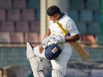 Mumbai player Sarfaraz Khan celebrates his century on the first day of the Ranji Trophy cricket match against Delhi Mumbai player Sarfaraz Khan celebrates his century on the first day of the Ranji Trophy cricket match against Delhi
