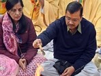Delhi CM Arvind Kejriwal with his wife Sunita Kejriwal performing havan during Sunderkand path at Rohini on Tuesday. Delhi CM Arvind Kejriwal with his wife Sunita Kejriwal performing havan during Sunderkand path at Rohini on Tuesday.