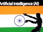 AI Artificial intelligence words, miniature of robot and an Indian flag are seen in this illustration taken December 21, 2023. REUTERS/Dado Ruvic/Illustration