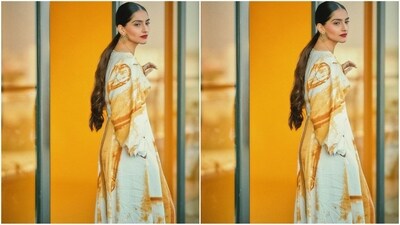 With the help of hairstylist Namrata Soni, Sonam styled her lush, long locks into a centre-parted, low ponytail, with her locks beautifully cascading down her back to finish off her look. (Instagram/@sonamkapoor) With the help of hairstylist Namrata Soni, Sonam styled her lush, long locks into a centre-parted, low ponytail, with her locks beautifully cascading down her back to finish off her look. (Instagram/@sonamkapoor)
