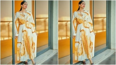 Sonam's stunning midi dress features accordion pleated shoulders, batwing sleeves, concealed pockets at the waist, the tie-on pattern on the bust, signature cynotype print adorning all over and a fit and flare hemline. (Instagram/@sonamkapoor) Sonam's stunning midi dress features accordion pleated shoulders, batwing sleeves, concealed pockets at the waist, the tie-on pattern on the bust, signature cynotype print adorning all over and a fit and flare hemline. (Instagram/@sonamkapoor)