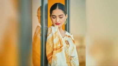 Her glamorous make-up look features nude eyeshadow, mascaraed lashes, winged eyeliner, darkened brows, dewy base, rosy cheeks and a bold shade of red lipstick. (Instagram/@sonamkapoor) Her glamorous make-up look features nude eyeshadow, mascaraed lashes, winged eyeliner, darkened brows, dewy base, rosy cheeks and a bold shade of red lipstick. (Instagram/@sonamkapoor)