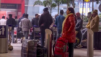 Passengers await at the Indira Gandhi International Airport on a cold winter morning, in New Delhi on Tuesday. (ANI) Passengers await at the Indira Gandhi International Airport on a cold winter morning, in New Delhi on Tuesday. (ANI)