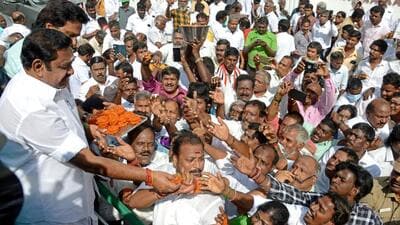 All India Anna Dravida Munnetra Kazhagam general secretary Edappadi K Palaniswami distributes sweets among the party supporters on the 107th birth anniversary of party founder MGR, at party headquarters, in Chennai on Wednesday (ANI) All India Anna Dravida Munnetra Kazhagam general secretary Edappadi K Palaniswami distributes sweets among the party supporters on the 107th birth anniversary of party founder MGR, at party headquarters, in Chennai on Wednesday (ANI)