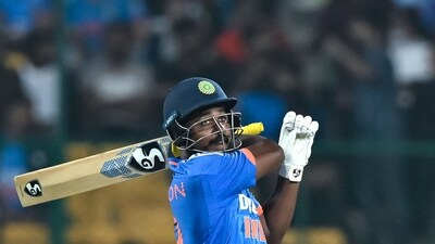 Sanju Samson watches the ball after playing a shot (AFP)