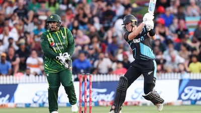 New Zealand's Finn Allen plays a shot while being watched by Pakistan's wicketkeeper Azam Khan (L) (AFP) New Zealand's Finn Allen plays a shot while being watched by Pakistan's wicketkeeper Azam Khan (L) (AFP)