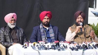 Congress MLA Sukhpal Singh Khaira along with PPCC chief Amarinder Singh Raja Warring and LoP Partap Singh Bajwa in Chandigarh on Wednesday. (HT)
