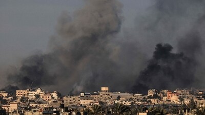 Smoke billowing over Khan Yunis in the southern Gaza Strip during Israeli bombardment, amid ongoing battles between Israel and the Palestinian militant group Hamas. (AFP) Smoke billowing over Khan Yunis in the southern Gaza Strip during Israeli bombardment, amid ongoing battles between Israel and the Palestinian militant group Hamas. (AFP)