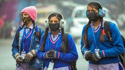 School students going to school on cold and foggy winter morning, in New Delhi, India, on Friday. (Sanjeev Verma/ Hindustan Times) School students going to school on cold and foggy winter morning, in New Delhi, India, on Friday. (Sanjeev Verma/ Hindustan Times)