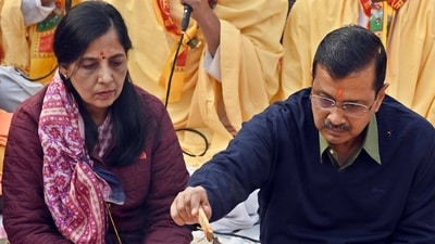 Delhi CM Arvind Kejriwal with his wife Sunita Kejriwal performing havan during Sunderkand path at Rohini on Tuesday. Delhi CM Arvind Kejriwal with his wife Sunita Kejriwal performing havan during Sunderkand path at Rohini on Tuesday.