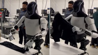 The image shows Tesla humanoid Optimus folding a t-shirt. (X/@elonmusk)