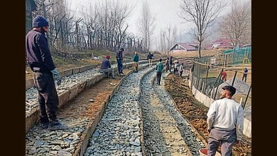 Work underway at the General Bipin Rawat Stadium in Baramulla district. (HT Photo)