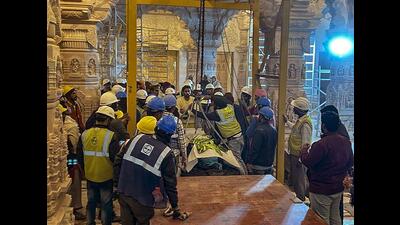 Workers bring the idol of Ram Lalla at the ‘Garbhagriha’ of Shri Ram Janmabhoomi Temple, ahead of the temple’s consecration ceremony, in Ayodhya, Wednesday. (PTI Photo) Workers bring the idol of Ram Lalla at the ‘Garbhagriha’ of Shri Ram Janmabhoomi Temple, ahead of the temple’s consecration ceremony, in Ayodhya, Wednesday. (PTI Photo)