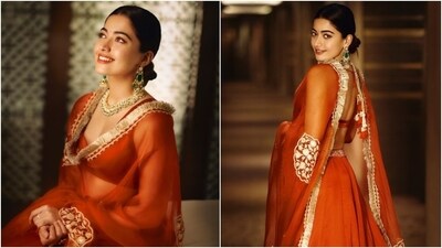 Rashmika Mandanna has a steal-worthy collection of traditional silhouettes in her closet. One look at her past sartorial choices and one would know that the Animal actor has a knack for choosing the most stunning and elegant ethnic looks - from silk sarees to embroidered chiffon drapes and heavily embellished lehengas. Her most recent photoshoot in a terracotta-toned lehenga with dori work is another addition to our favourites list. Check out the pictures inside. (Instagram) Rashmika Mandanna has a steal-worthy collection of traditional silhouettes in her closet. One look at her past sartorial choices and one would know that the Animal actor has a knack for choosing the most stunning and elegant ethnic looks - from silk sarees to embroidered chiffon drapes and heavily embellished lehengas. Her most recent photoshoot in a terracotta-toned lehenga with dori work is another addition to our favourites list. Check out the pictures inside. (Instagram)