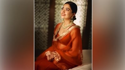 Meanwhile, Rashmika draped the dupatta on her shoulders. It has white dori embroidery and a heavy gold-thread lace border, adding bling to the outfit. For the accessories, she chose intricate gold and semi-precious emerald jewellery, including a choker, kadhas, rings and XL jhumkas. (Instagram) Meanwhile, Rashmika draped the dupatta on her shoulders. It has white dori embroidery and a heavy gold-thread lace border, adding bling to the outfit. For the accessories, she chose intricate gold and semi-precious emerald jewellery, including a choker, kadhas, rings and XL jhumkas. (Instagram)