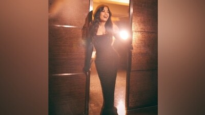 Recently, Rashmika attended the success bash for Sandeep Reddy Vanga's Animal in Mumbai. She slipped into a black bodycon gown for the occasion. Styled by Anushka Damani and Ami Patel, the outfit features a strapless silhouette, a plunging square neckline, shimmering black beads embellished all over, a gathered design, a maxi-length hem, and a figure-hugging fitting accentuating her curves. (Instagram) Recently, Rashmika attended the success bash for Sandeep Reddy Vanga's Animal in Mumbai. She slipped into a black bodycon gown for the occasion. Styled by Anushka Damani and Ami Patel, the outfit features a strapless silhouette, a plunging square neckline, shimmering black beads embellished all over, a gathered design, a maxi-length hem, and a figure-hugging fitting accentuating her curves. (Instagram)