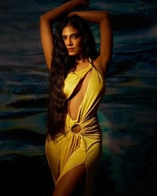 Malavika Mohanan in a yellow cut-out gown (Photo: Instagram) Malavika Mohanan in a yellow cut-out gown (Photo: Instagram)