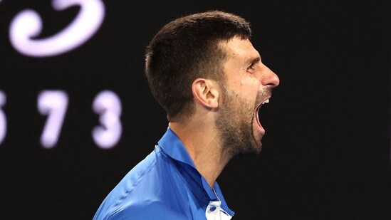 Serbia's Novak Djokovic celebrates victory against Australia's Alexei Popyrin (AFP)
